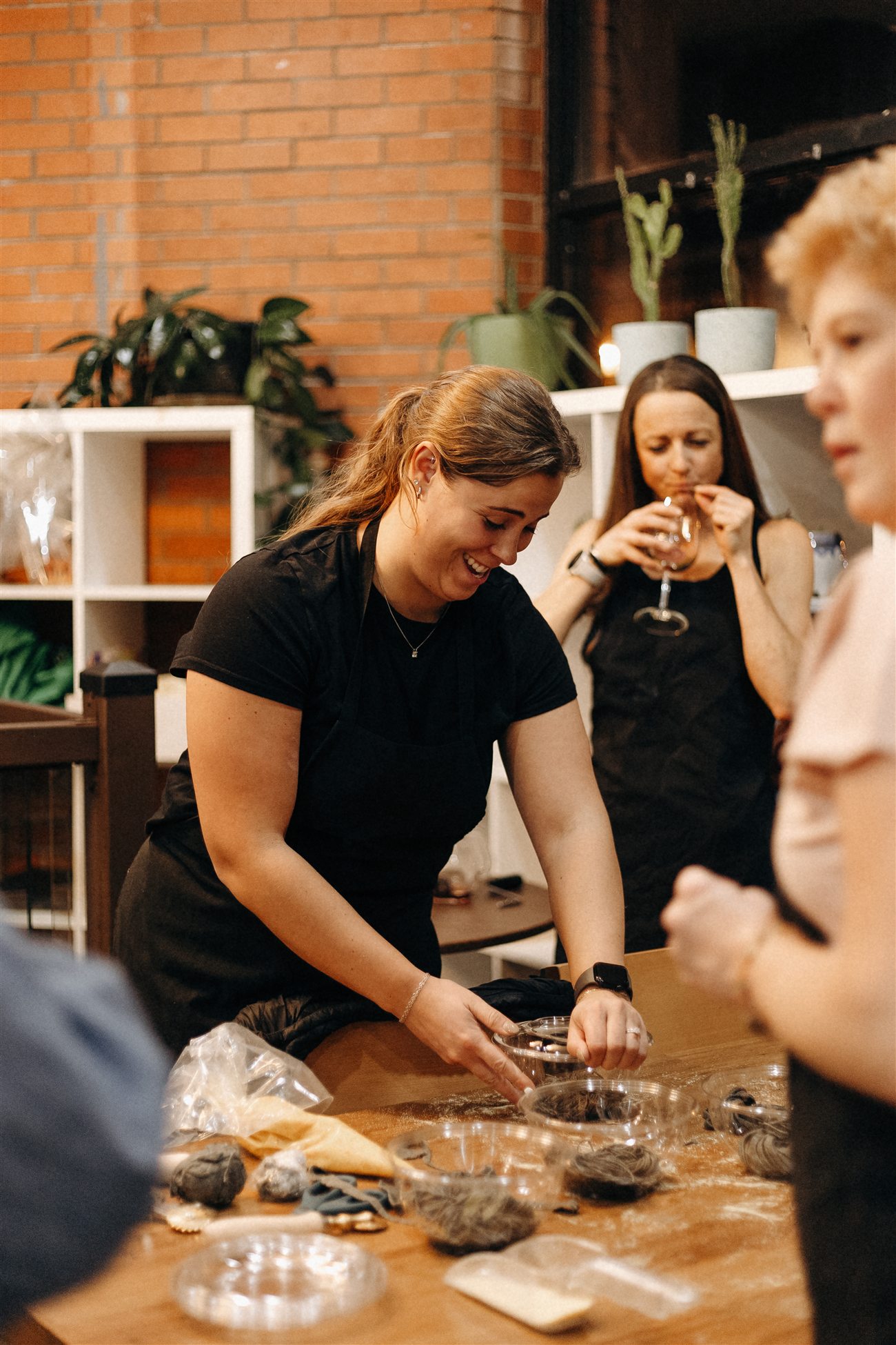 Guests gathered around the table during a pasta evening at da Cecot, Edmonton