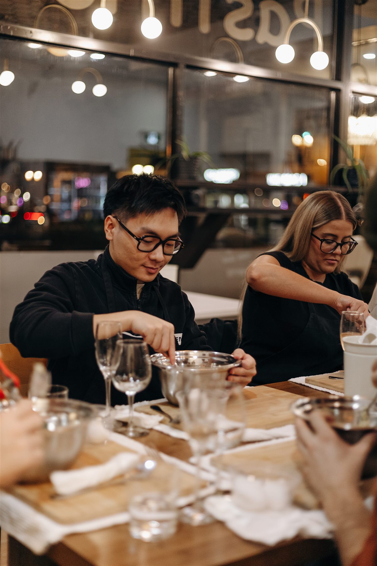 Guests around the table at a da Cecot night, Edmonton